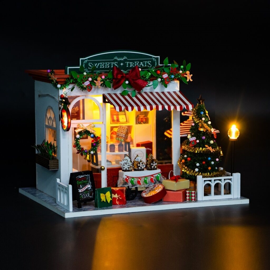 2Kids Mänguasjad - Miniatuurne jõulukommipood majake 2xAAA