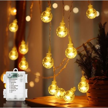 Aigostar - LED Väli valguskett 100xLED/3xAA/8 funktsiooni 10,3 m IP44 soe valge