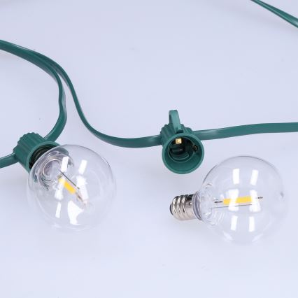 Brilagi - LED väljas kasutatav dekoratiivne girland GIRLANDA 25xE12/0,8W/230V 20m roheline IP44 soe valge
