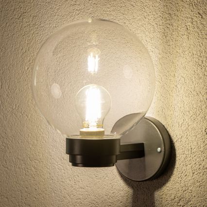 BRILAGI - Välisseinale mõeldud seinavalgusti HARBOR 1xE27/40W/230V IP33 must/läbipaistev