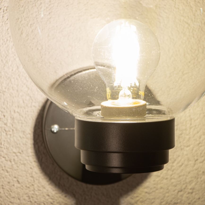 BRILAGI - Välisseinale mõeldud seinavalgusti HARBOR 1xE27/40W/230V IP33 must/läbipaistev
