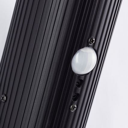 Brilliant - Väli seinavalgusti koos anduriga KALEO 1xE27/10W/230V IP44 must