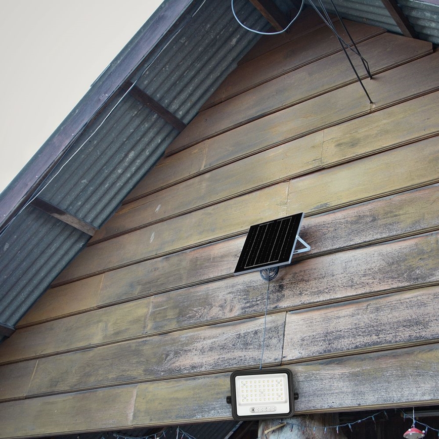 Hämardatav LED päikesepaneeliga reflektor LED/100W/3,2V 2000-8000K IP65 5000 mAh must + kaugjuhtimispult