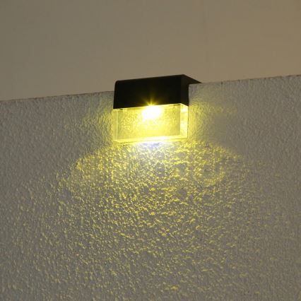 KOMPLEKT 2x LED RGB Päikesepaneeliga seinavalgusti LED/1W/1,2V 3500K IP65