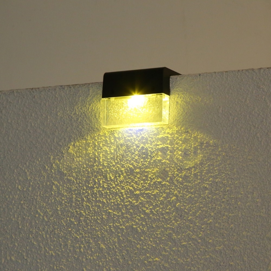 KOMPLEKT 2x LED RGB Päikesepaneeliga seinavalgusti LED/1W/1,2V 3500K IP65