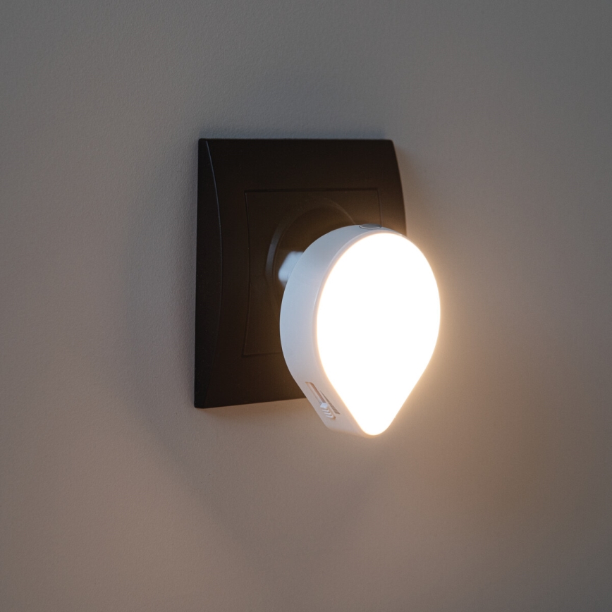 LED hämardatav öövalgusti hämarusanduriga pistikupessa ULOV LED/0,5W/230V valge