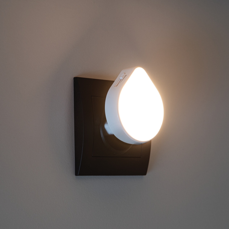 LED hämardatav öövalgusti hämarusanduriga pistikupessa ULOV LED/0,5W/230V valge