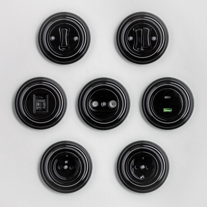 Kliklap - retrostiilis nupp raamiga, must