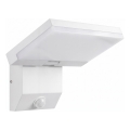 LED välisseinavalgusti liikumisanduriga LED/18W/230V IP44 valge