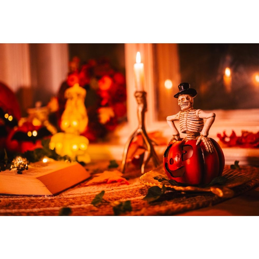 LED Kaunistus HALLOWEEN LED/2xLR44/soe valge luukere kõrvitsa sees vaik