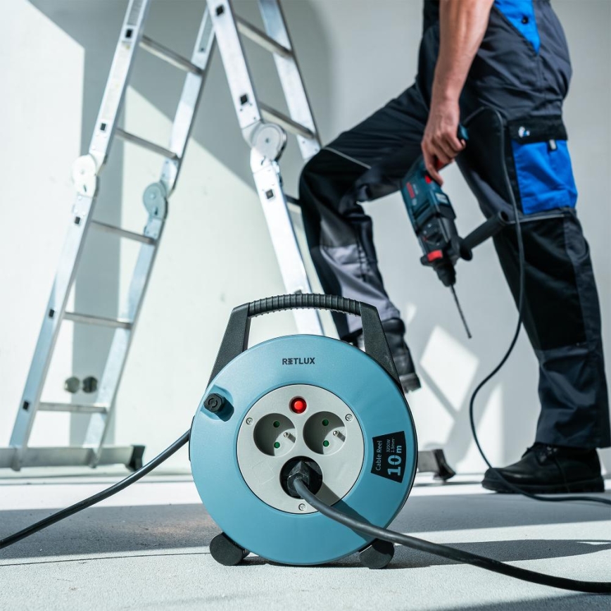 Retlux - rulliga 3-pesaline pikendusjuhe, tüüp E, 10 m, sinine/must