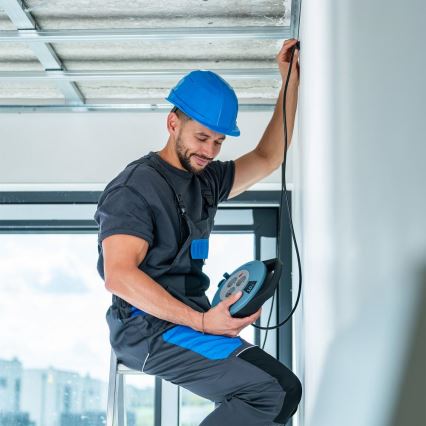 Retlux - rulliga 3-pesaline pikendusjuhe, tüüp E, 10 m, sinine/must